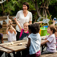 Teacher and kids school learning ecology gardening