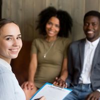 Portrait of smiling woman psychologist and happy african america