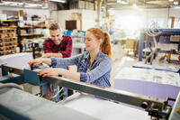Photo of workers in printing factory