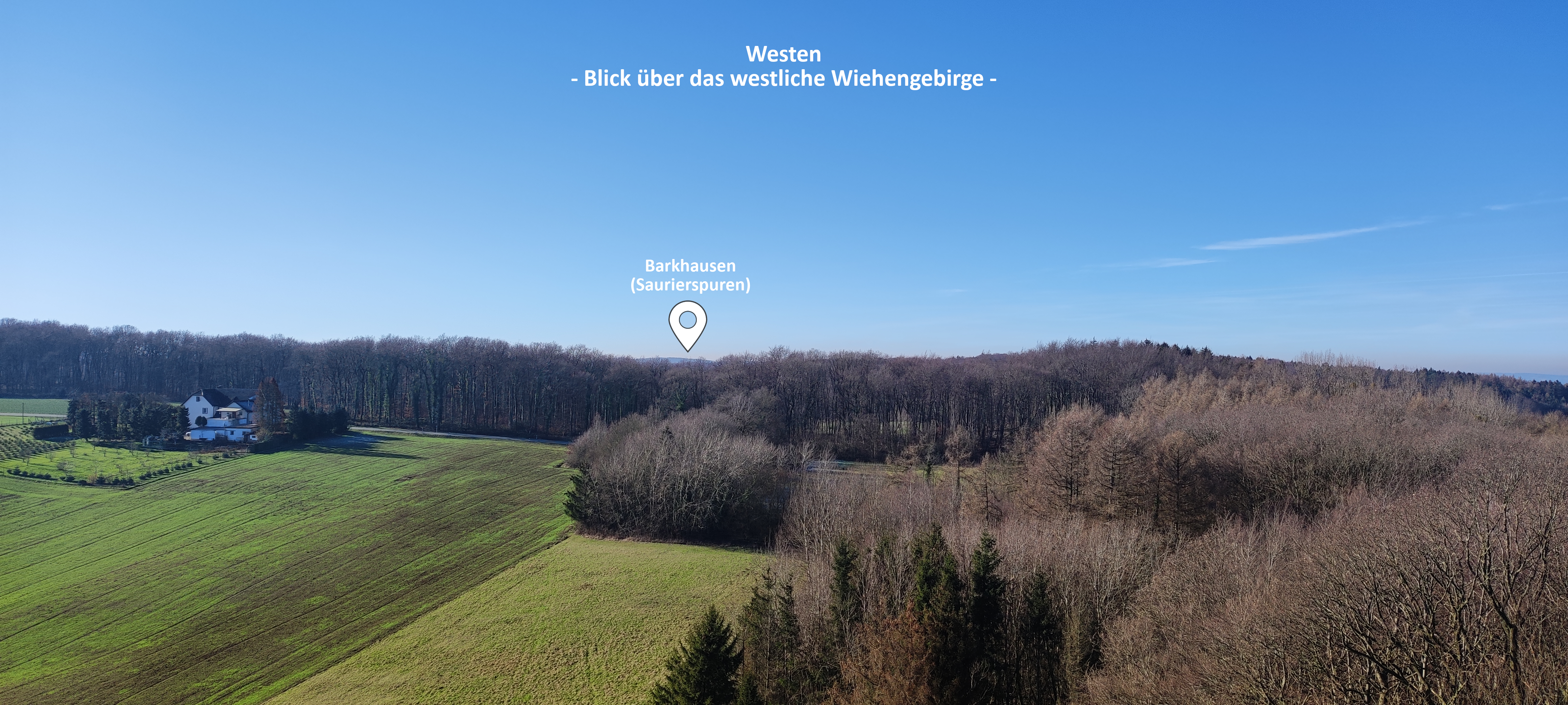 Zu sehen ist der Blick vom Wiehenturm in Richtung Westen auf das westliche Wiehengebirge